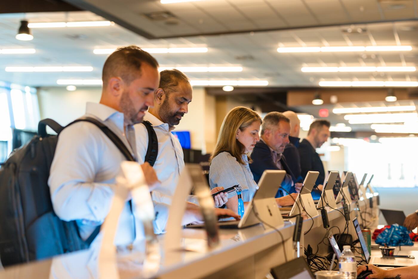 Attendees checking in at registration
