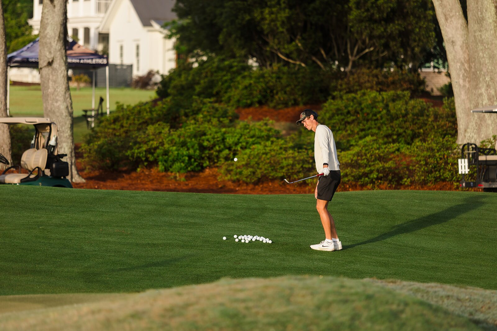 Caddies walking together during The Ford Collegiate
