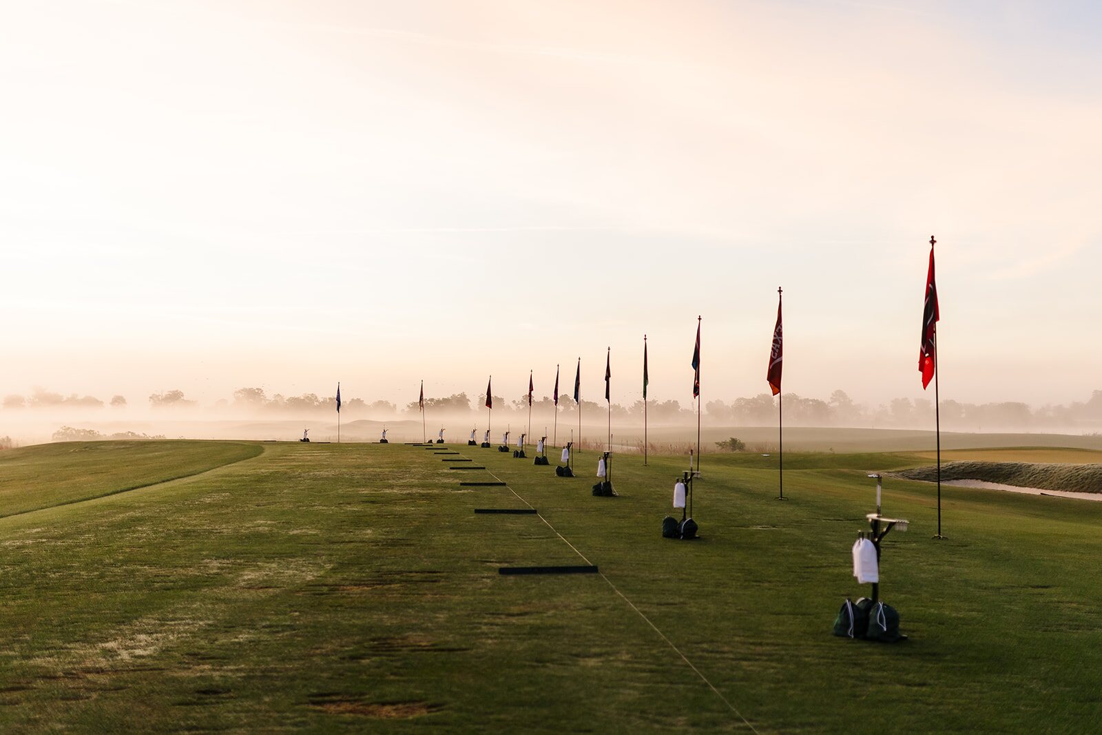 Driving range at dawn at The Ford Field and River Club